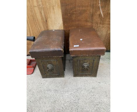 A PAIR OF VINTAGE BRASS COVERED AND LEATHER TOPPED CLUB FENDER BOXES WITH LION HEAD DECORATION 