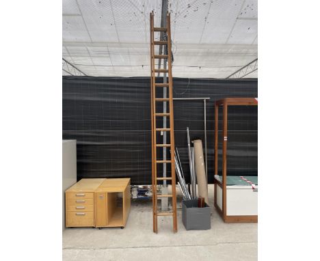 AN EXTENDING 20 RUNG WOODEN LADDER 