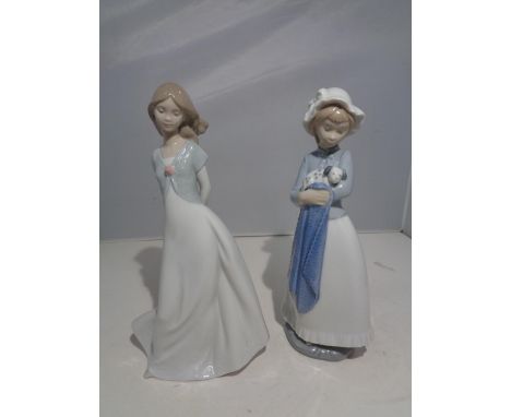 TWO NAO FIGURINES OF ALADY AND A LADY WITH A DOG 