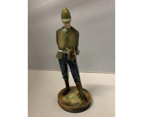 A CERAMIC SOLIDER FIGURE SIGNED J CHITON 1980 