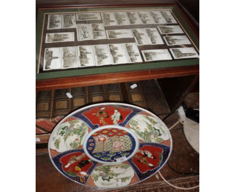 Japanese porcelain figures charger, 39cm diameter, plus cigarette cards in frame