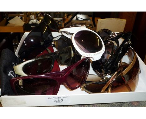 Tray of vintage and modern sunglasses