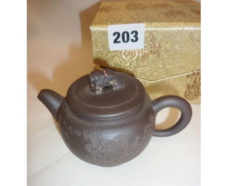 Chinese red ware teapot in protective case and silk cover