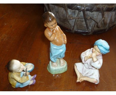 Three Royal Worcester figurines modelled by F.G. Doughty - "Burma", "India" and "China"