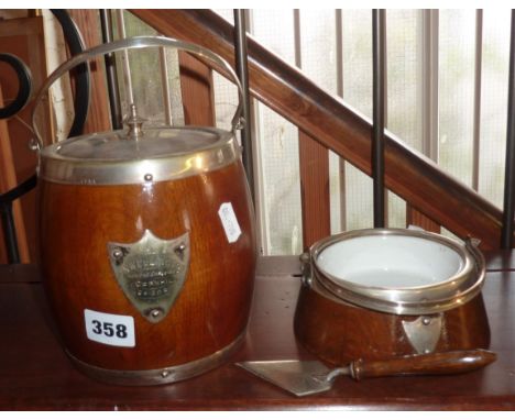 Oak and silverplated biscuit barrel with inscription, together with a ceramic lined butter dish and trowel, c.1930s