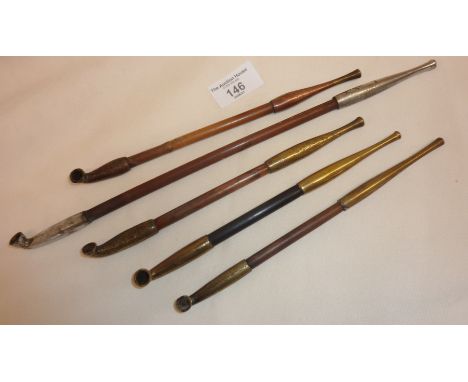 Five antique Japanese bamboo opium pipes, some engraved to brass and copper mouthpieces, etc.