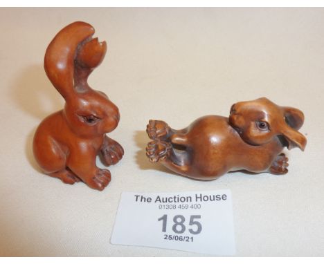 Japanese signed boxwood hare netsuke and another similar