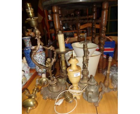 Four various brass table lamp bases and three others