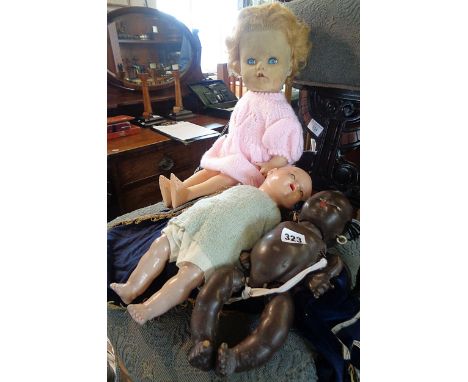 Vintage dolls- Canadian "Reliable" black doll, composite baby doll with glass eyes-impressed as "D British sp a"  and another