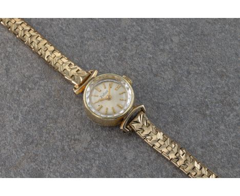  A Zodiac wristwatch 18mm. cocktail wristwatch with round case, gold dial, gold batons, gold hands, to fancy link bracelet, m