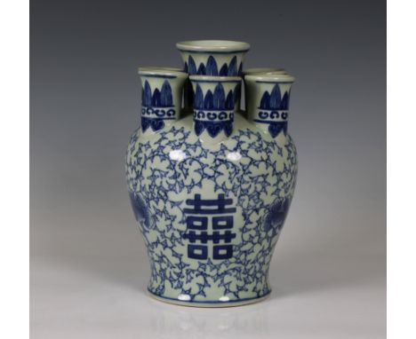  A Chinese blue &amp; white seven stem vase with blue four character seal mark to underside, 23.4cm. high. 