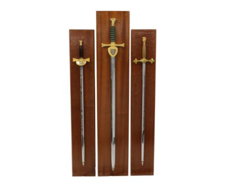  Three Wilkinson Sword Commemorative Liberation Swords and a Dagger  of different designs made to commemorate the 25th Annive