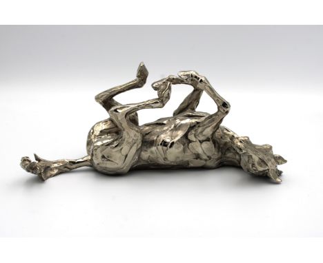  Kate Denton (English, b.1954) "Rolling Horse", nickel plated bronze, signed "K Denton" lower edge, 24cm. long, 11cm. high. P
