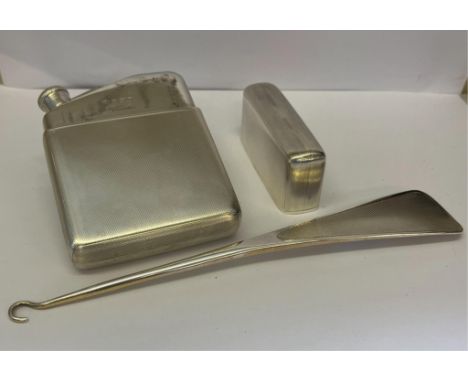  A silver engine turned spirit flask with gilded interior to detachable lid, personal inscription dated 1940, "marked "Martin
