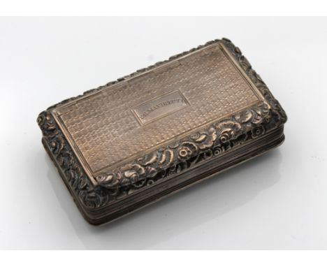  A George IV silver snuff box Thomas & William Simpson, Birmingham, 1822, of rectangular form with cast foliate border, engin
