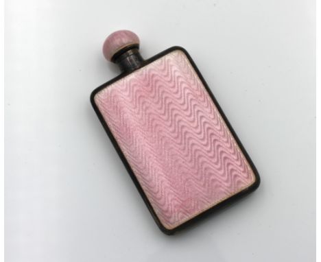  A white metal pink guilloche enamel scent bottle of flask form, screw-off lid, 7cm. long. 