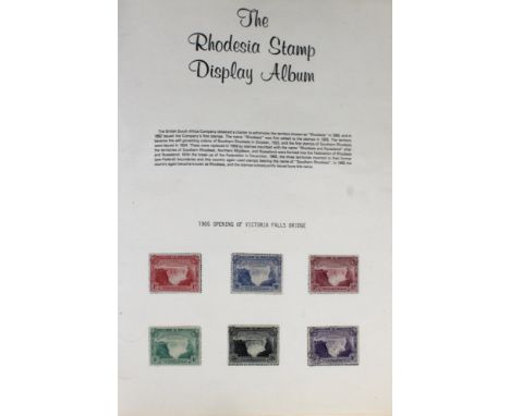  Philately interest - Stamp binder Rhodesia 1905-1983, to include set of six 1905 opening of Victoria Fall bridge, together w