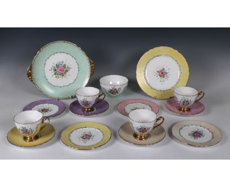  An attractive Shelley England porcelain part tea service harlequin colours, comprising four cups &amp; saucers, four tea pla