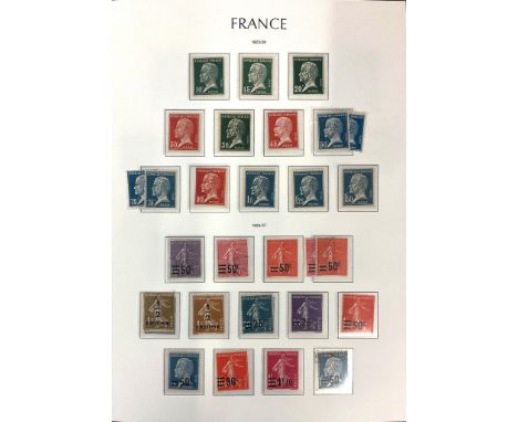  Philately interest - A massive collection of Worldwide stamps contained in eleven binders / albums, to include Austria, Roma