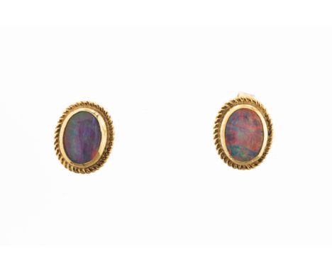  A pair of opal stud earrings in 9ct yellow gold, set with oval-shaped opal triplets. 