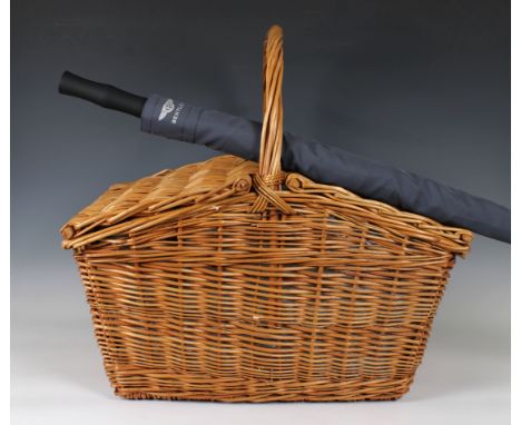  A Bentley wicker picnic basket and contents mostly bearing the Bentley insignia comprising six porcelain cups and saucers by