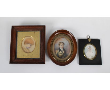  Attributed to Emily Farmer (English, 1826-1905) Study of a Child's Head, miniature oval watercolour, wooden frame with gilt 