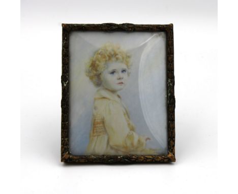  A 1920s-30s portrait miniature of a young girl believed Vivien Mary Spence, signed 'Forward', watercolour on ivory, 9.3cm. h