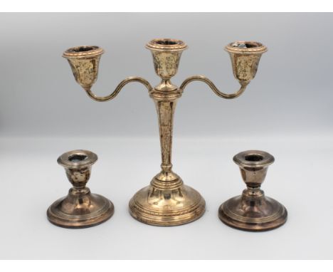  A two branch silver candelabra Elkington &amp; Co Ltd, Birmingham, 1968, of typical form, raised on domed circular foot, 21c