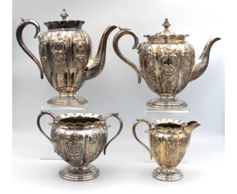  A silver plate four piece tea &amp; coffee service by William Page &amp; Co, of pedestal form with foliate scroll repouss‚ d
