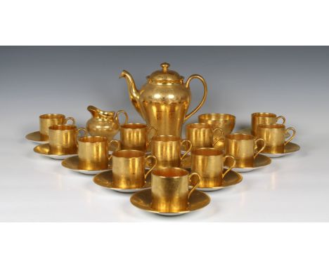  A Minton, T Goode &amp; Co, bone china coffee service 1960's, with tooled gilded roses and branches decoration, comprising a