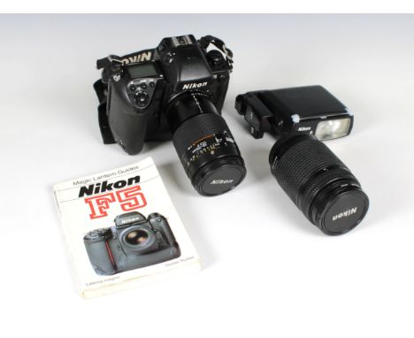  A Nikon F5 camera with Nikon AF Nikkor 35-70mm 1:2,8 D lens and a Nikon ED AF Nikkor 70-300mm 1:4-5.6 D lens, Speedlight SB-