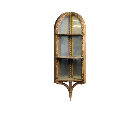  A late 19th century gilt and composition mirrored corner shelf 