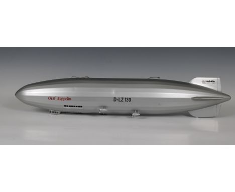  A Marklin Luftschiff 'Graff Zeppelin' late 1990's, model 11400, 60cm. long, silver painted with ?Graf Zeppelin? in red and ?