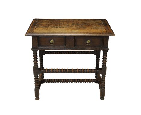  An English 17th century oak side table with two short drawers above four bobbin turned legs and stretcher, original brass dr