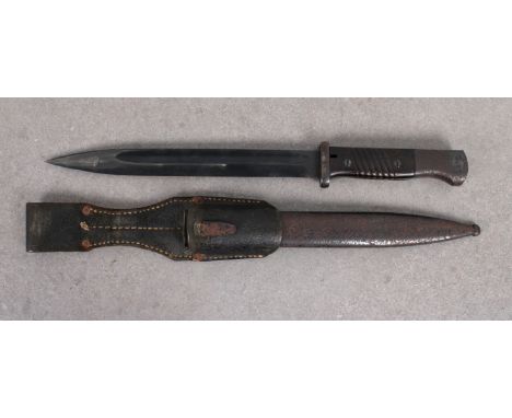  A WWII German Army K98 bayonet 25cm. single edge fullered blued steel blade stamped Coppel G.m.b.H., 9051d, dated 1937, two 