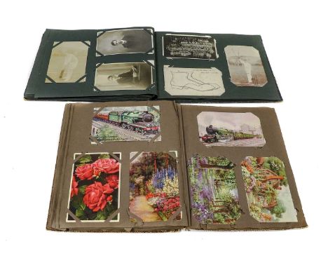Two slim albums each holding approx. 100 cards. The first holding a good selection of Military cards both British and trench 
