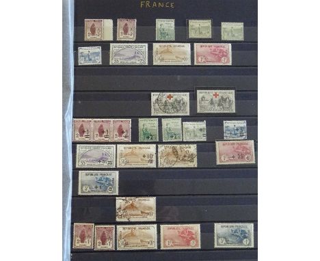 One of the better books from the 170-volume worldwide collection (Lot 178), a large stockbook with about 2000 mint and used s