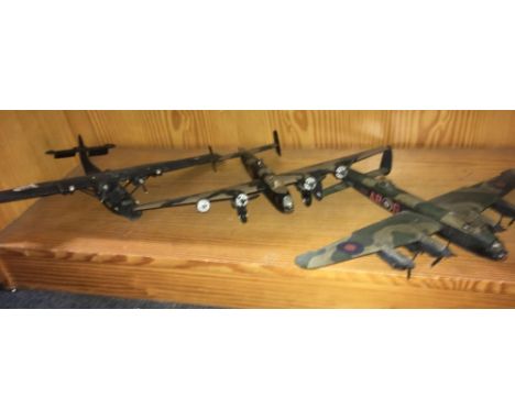 SHELF WITH  3 MADE UP PLASTIC KIT BOMBERS