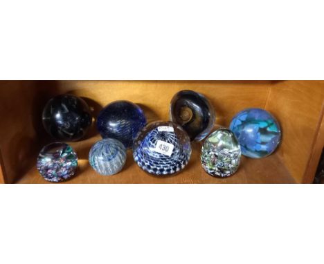 SHELF OF PAPERWEIGHTS