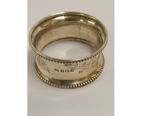 A PLAIN SILVER BEADED EDGE NAPKIN RING, B'HAM 1926