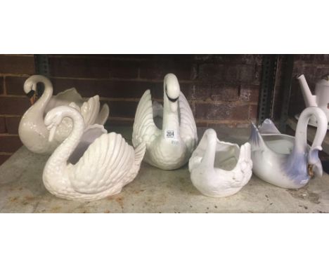 SHELF OF 5 SWANS, 2 BY DARTMOUTH POTTERY, SWAN WITH ORANGE BEAK &amp; LEGS - WING CRACKED