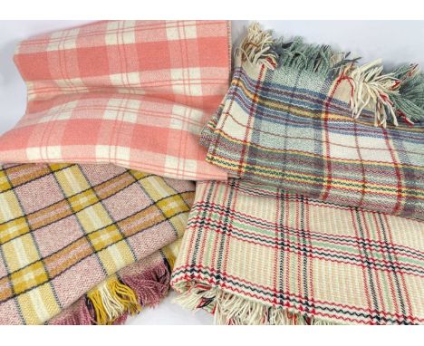 FOUR VINTAGE WELSH CHECK BLANKETS, various colourways, three with fringe (4)Provenance: private collection CarmarthenshireCom