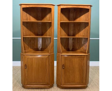 TWO MID-CENTURY ERCOL WINDSOR 743C CORNER CABINETS, gold label, solid elm, two fixed shelves above single-door cabinet, 179h 