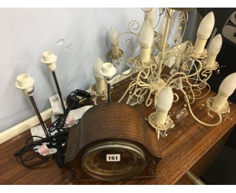 Mantle clock, chandelier and three lamps