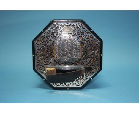 A C. Wheatstone 69 button (keys) concertina, serial number 23702, circa 1905-1910, with box bearing label 'C. Wheatstone &amp