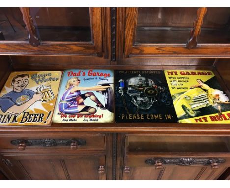 Four enamel style signs