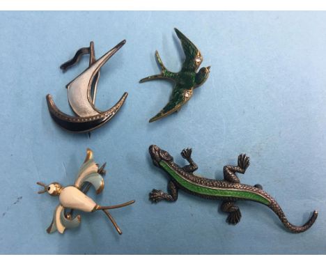 Four enamel brooches