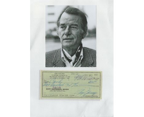 Gig Young signed City National Cheque dated 18th Feb 1972 and black and white photo both fixed to A4 sheet. Good condition. A