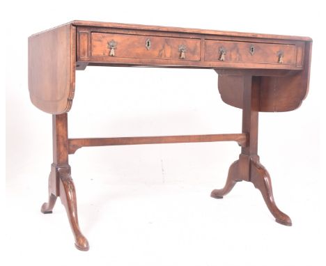 A Regency early 19th century walnut drop leaf sofa writing table desk. The table having a rectangular top with short drop lea