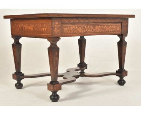 A Dutch 18th century marquetry &amp; rosewood inlaid library writing table desk. The table having a rectangular flared marque